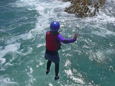 Coasteering jump into sea on school trip